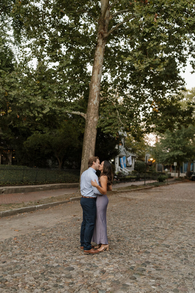 A couple walking down a cobblestone street in the historic Lockerbie Square neighborhood in downtown Indianapolis.